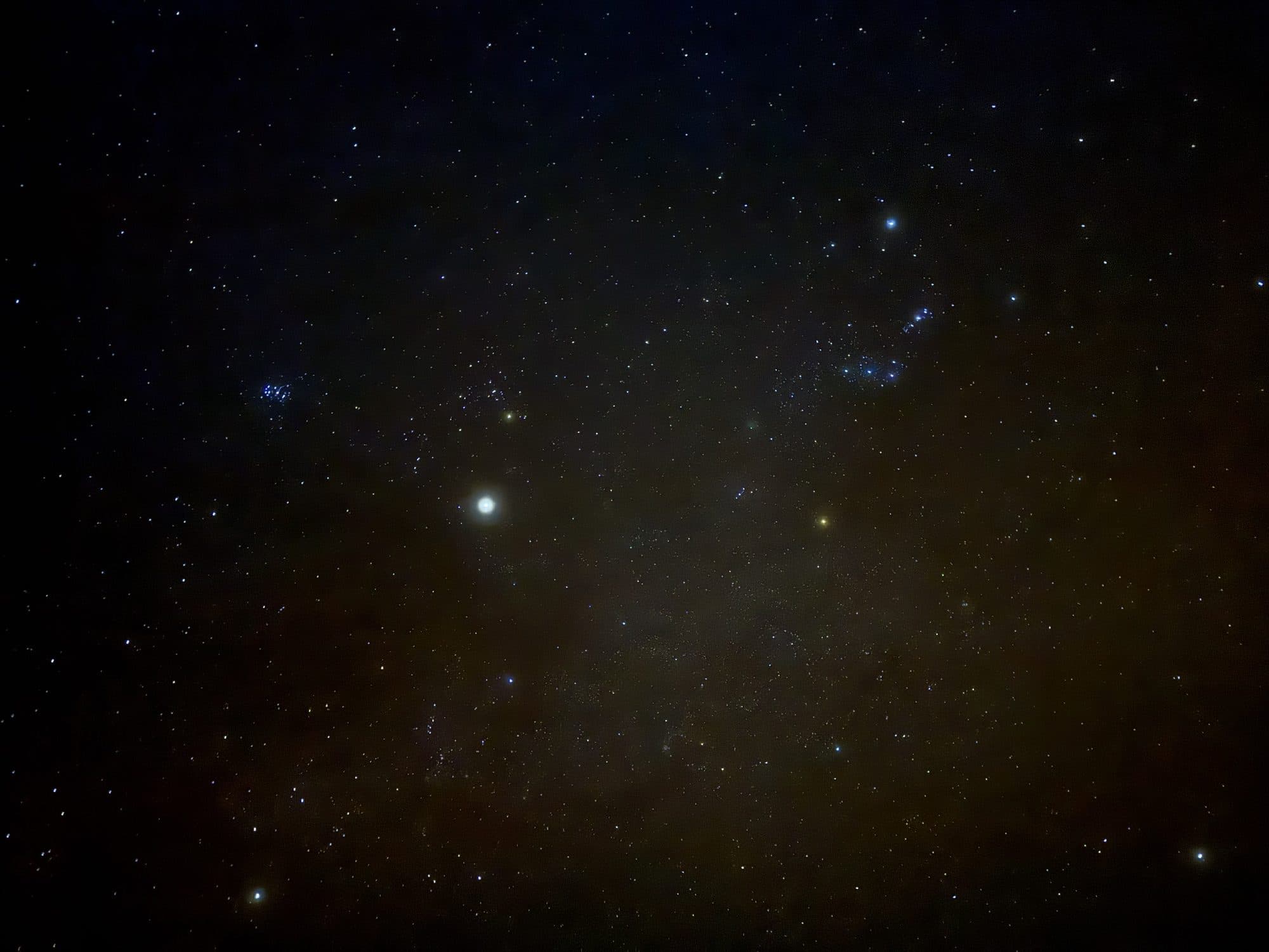 The winter sky over Bryce Canyon with Orion and the Pleiades overhead